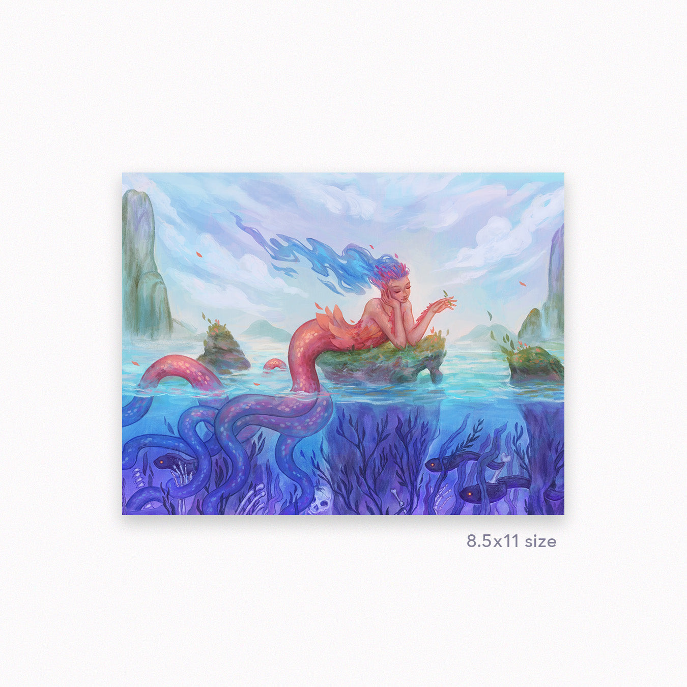 A framed painting of a beautiful mermaid with pink scales and blue flowing hair.